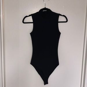 Black mock neck sleeveless seamless rib bodysuit
